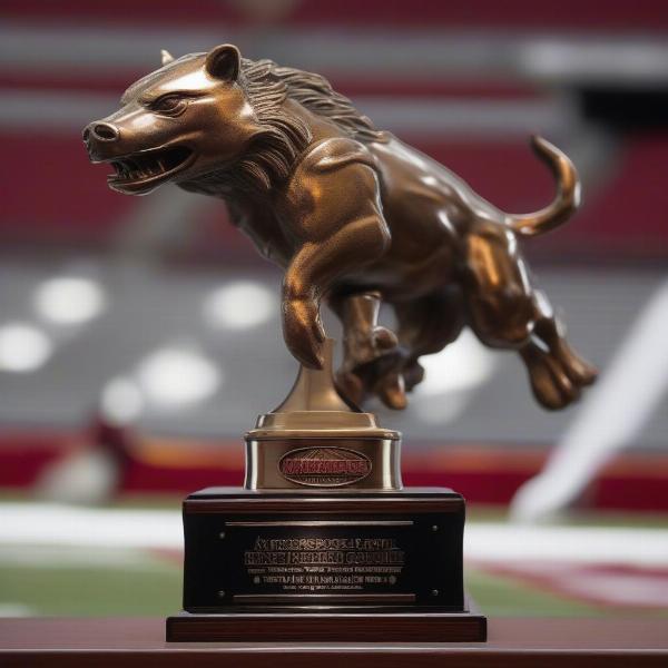 arkansas-razorbacks-football-bowl-game-trophy-showcasing-team-success