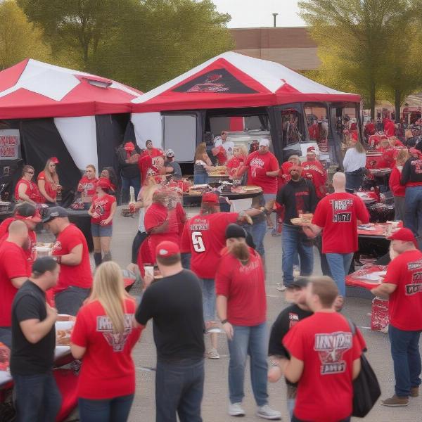 arkansas state football fans tailgating before a game