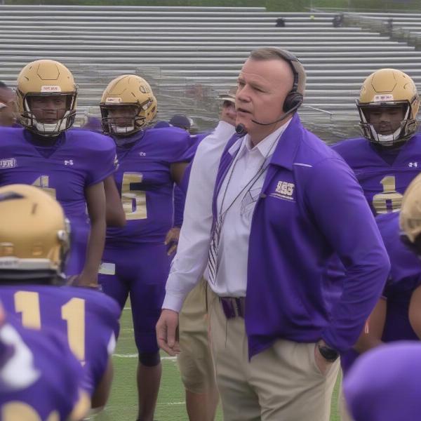 Bishop Guilfoyle coach on sideline directing players