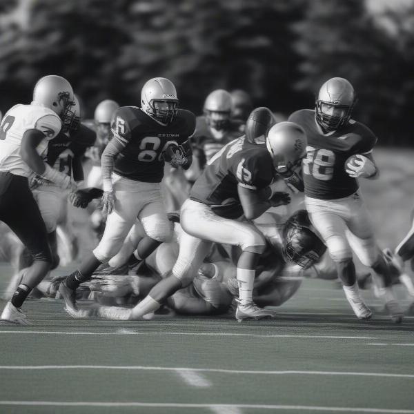 central catholic high football players in action