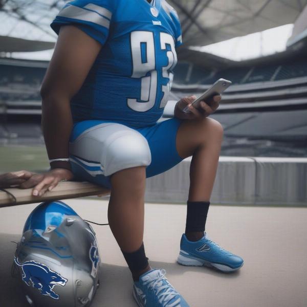 Detroit Lions fan checking game schedule on phone