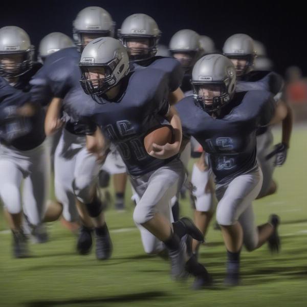 east jackson football players in action