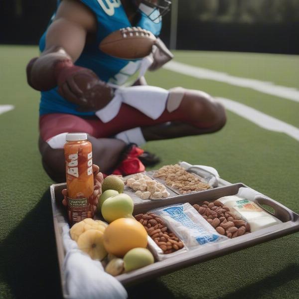 Football player holding post game balanced snack