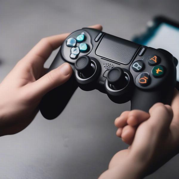 human hand holding game controller