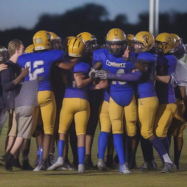 commerce-high-team-celebrating-win