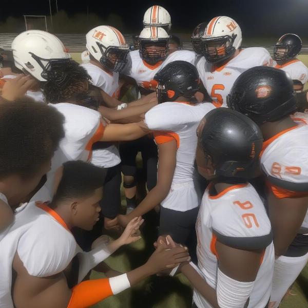 hoover-high-football-players-huddle