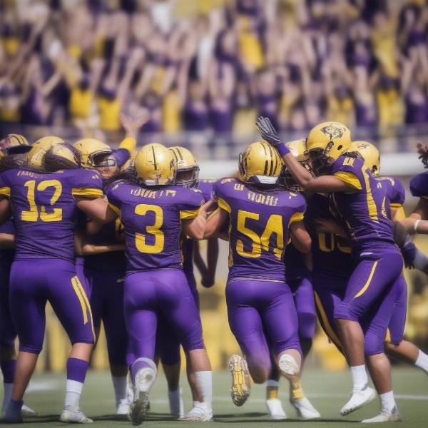 jmu dukes team celebrates winning game