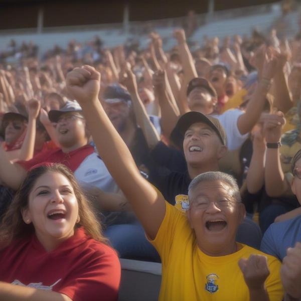 fans cheering on los banos city football game