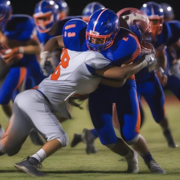 madison-central-defensive-player-tackling