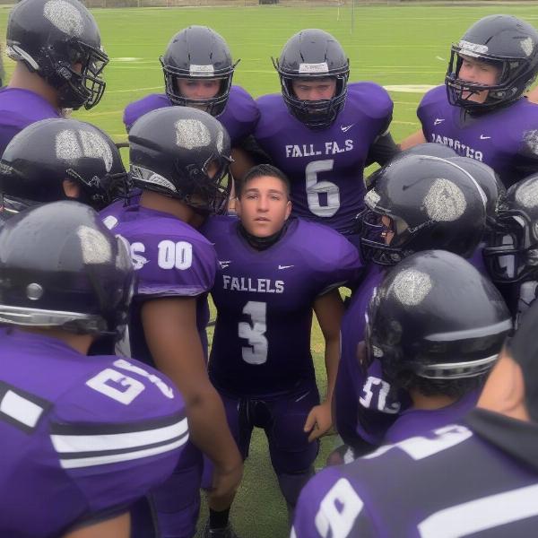 marble-falls-team-huddling-during-football-game