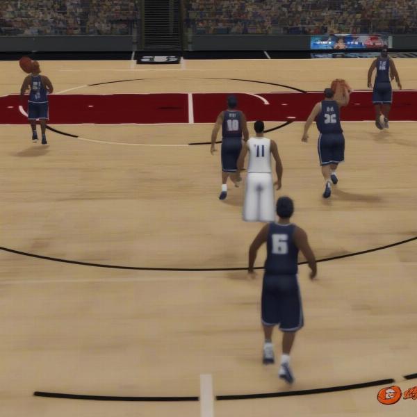 college basketball action gameplay on xbox 360 with team specific uniforms and arenas