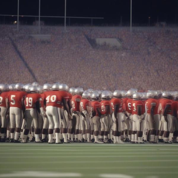 Two football teams face off on a field