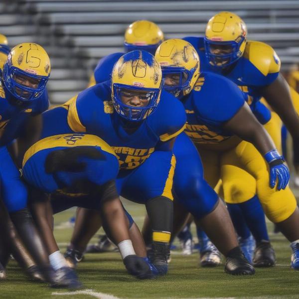 Oscar Smith Football Team offensive line in action 