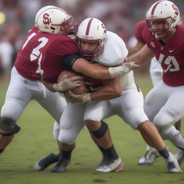 stanford-defensive-players-tackling