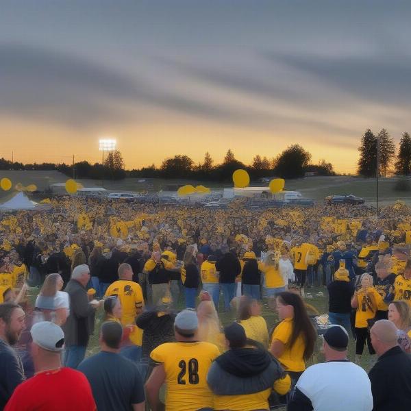 A community tailgate party before a Tri Valley football game, showing families and friends gathered with food and team spirit