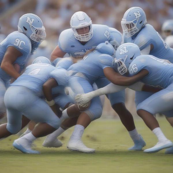 unc defense players tackle opponent