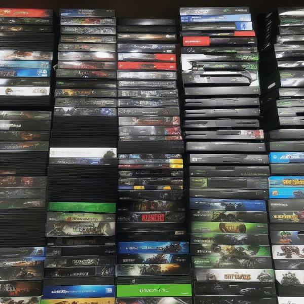 stack of used xbox one games